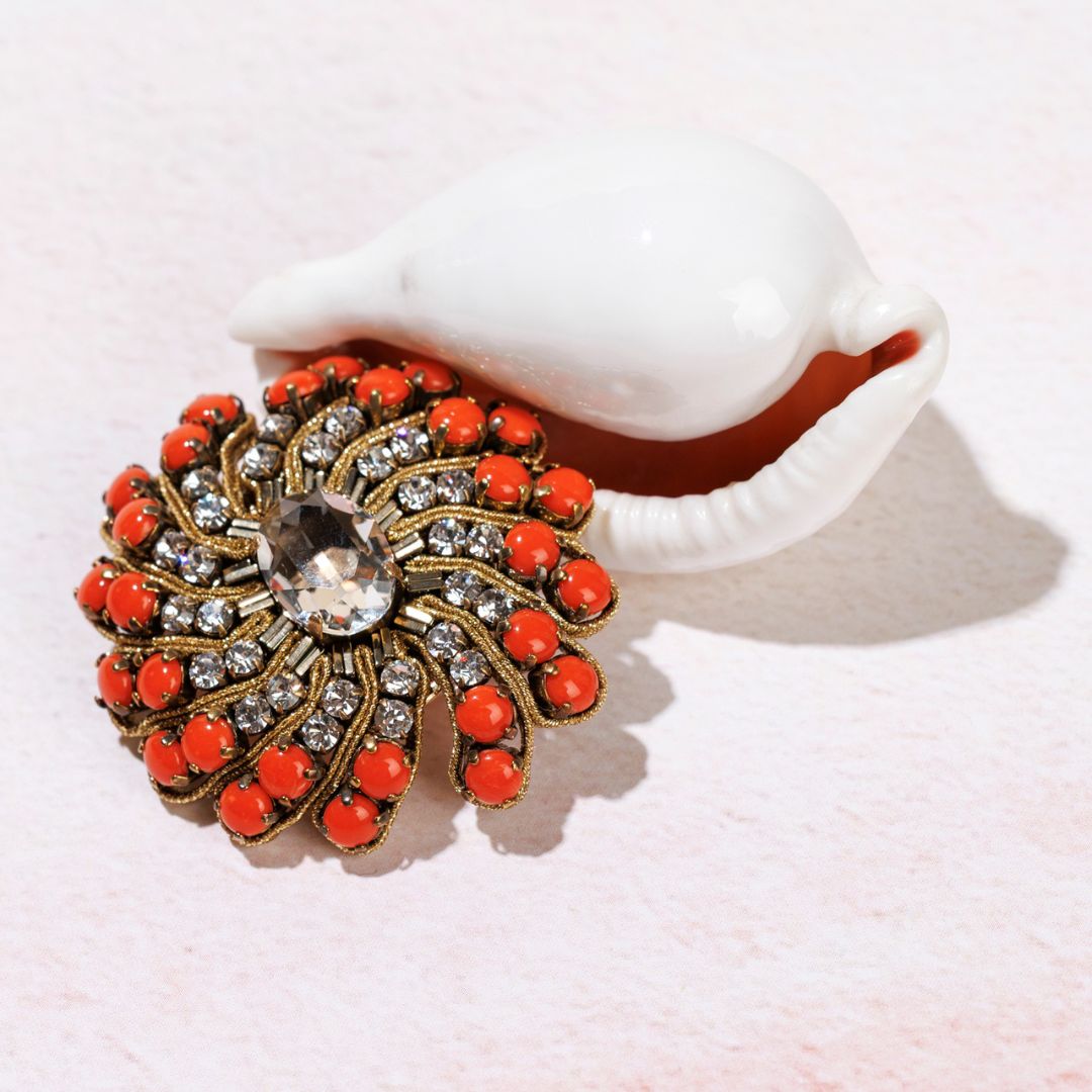 TOSCA gold brooch