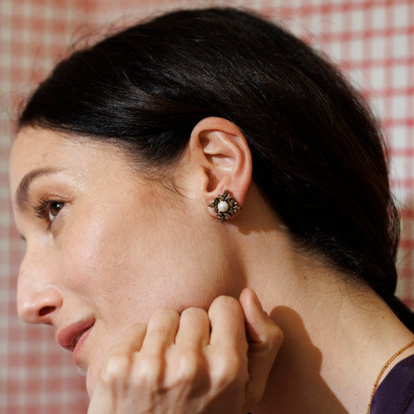 CHECKS with pearl earrings