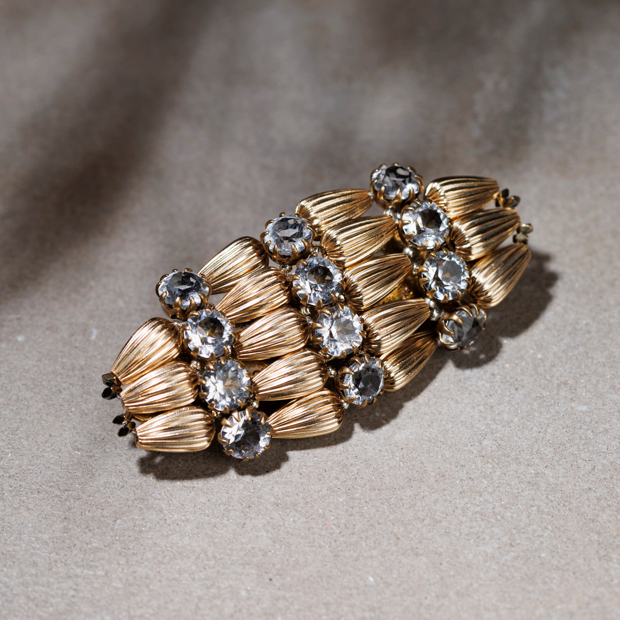 BREZZA gold and crystal brooch