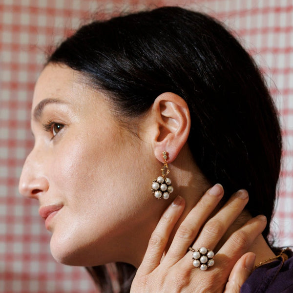 TRINA with pearl earrings
